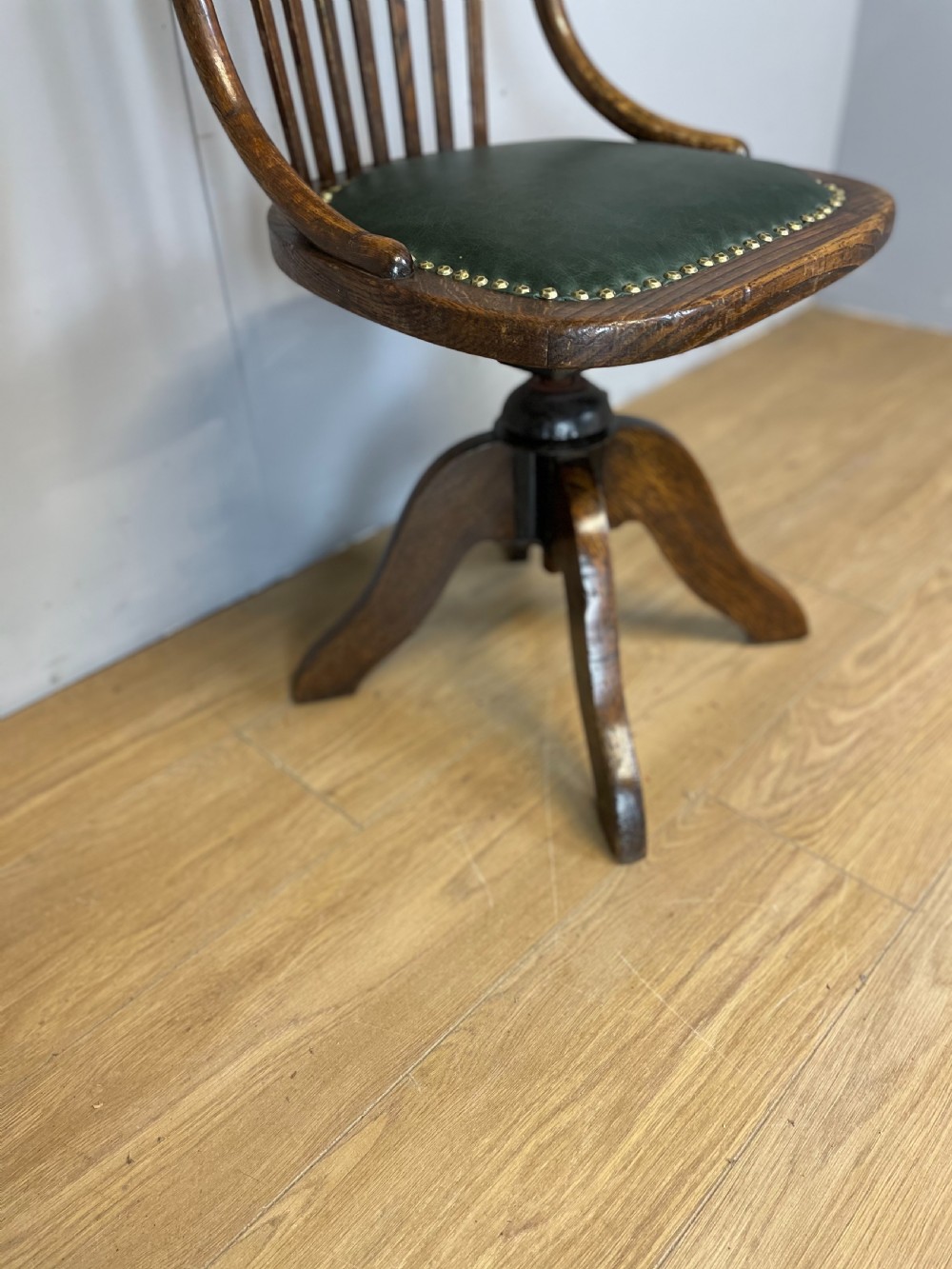 Nineteenth century solid oak revolving desk chair in green leather  View III