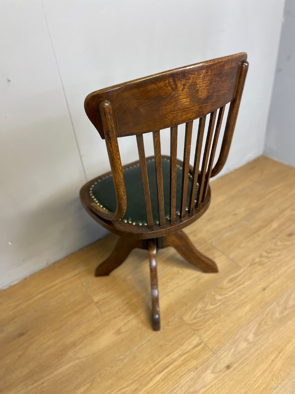 Nineteenth century solid oak revolving desk chair in green leather  View V