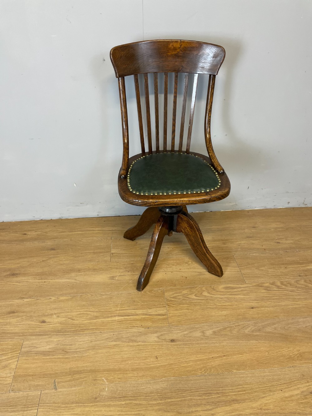 Nineteenth century solid oak revolving desk chair in green leather  View IX