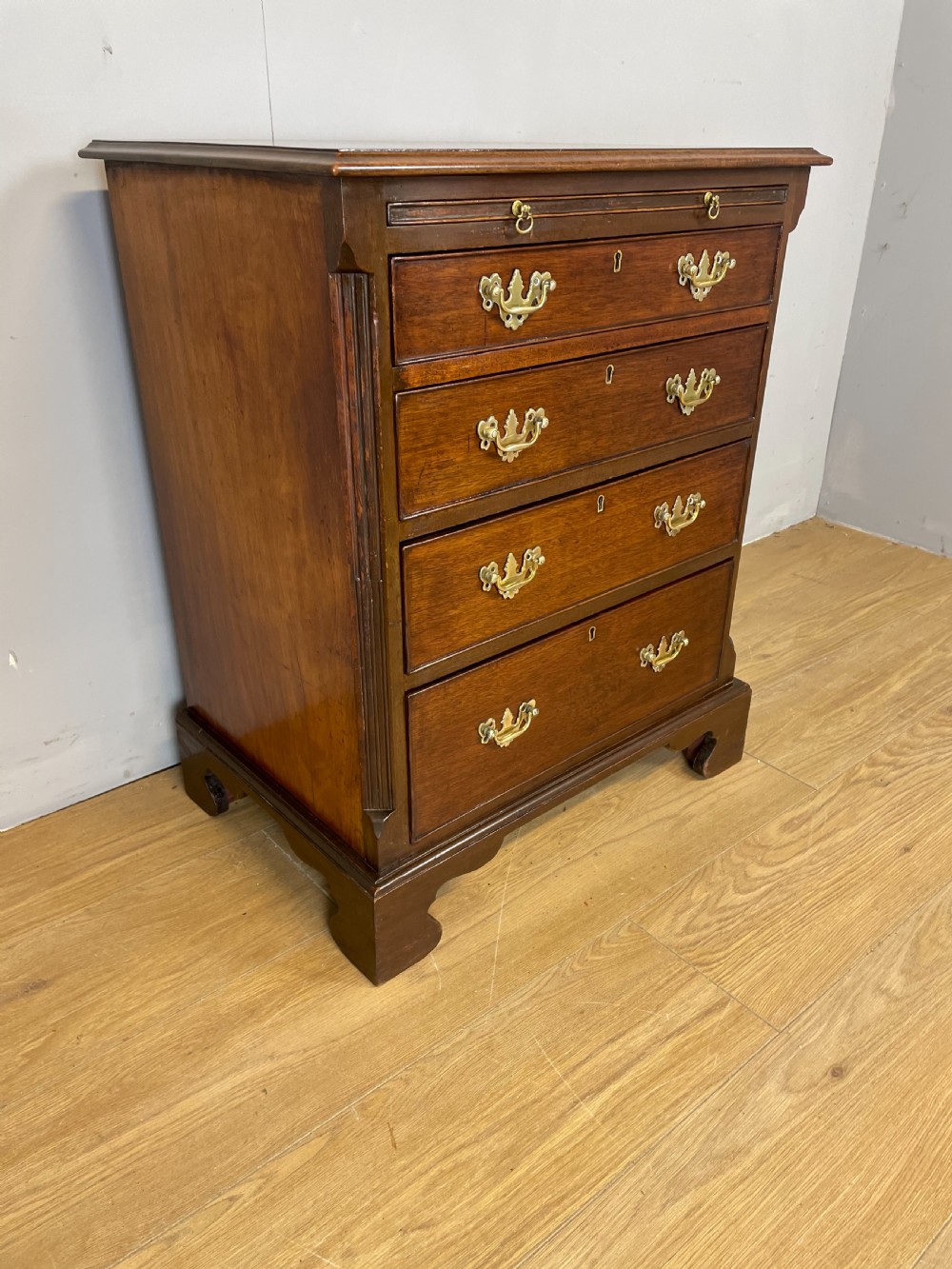 Nineteenth century small mahogany bachelors chest View XV
