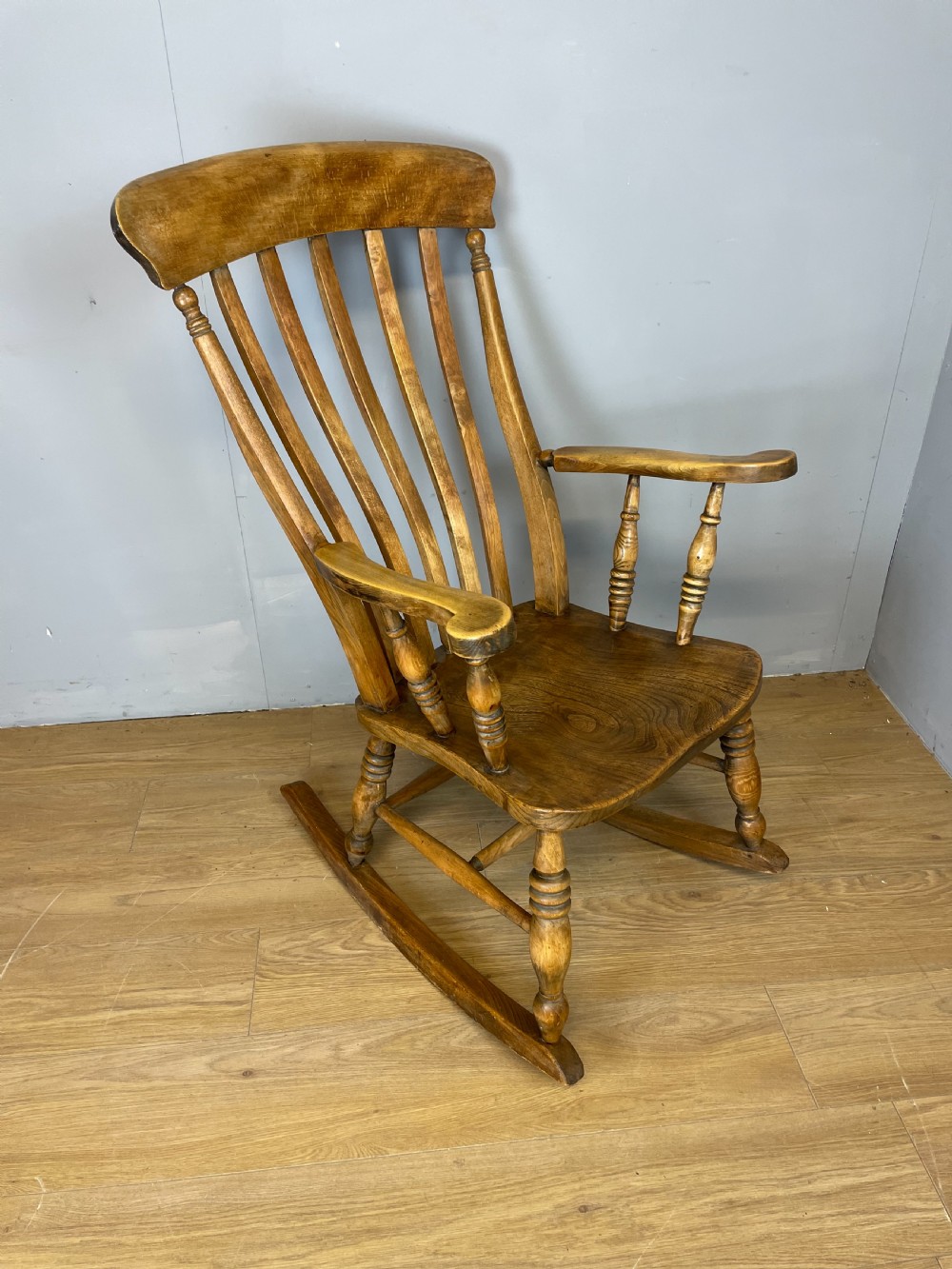 Nineteenth century slat back elm and beech farmhouse rocking chair