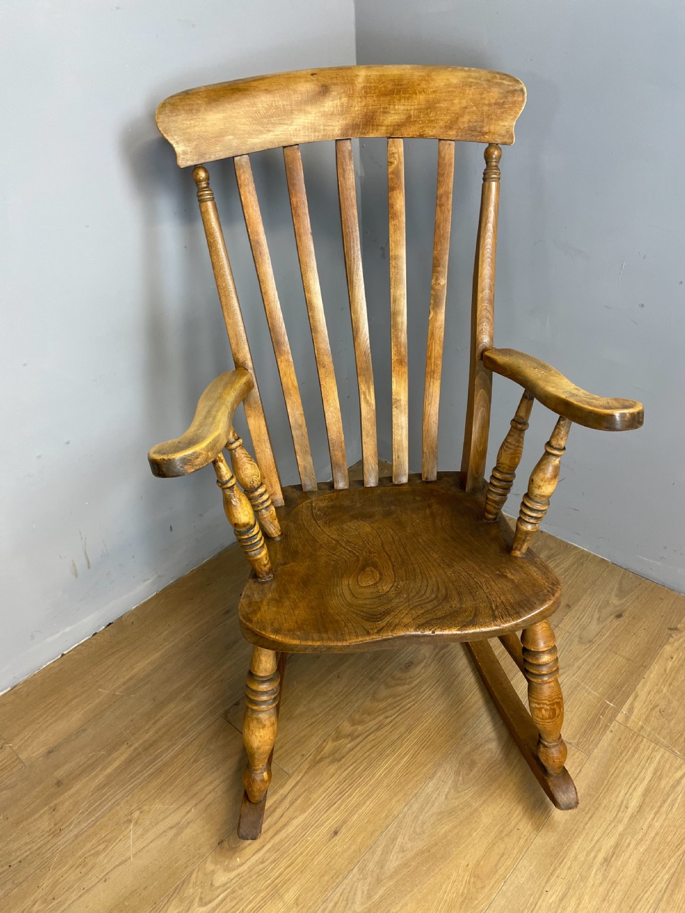 Nineteenth century slat back elm and beech farmhouse rocking chair View VIII