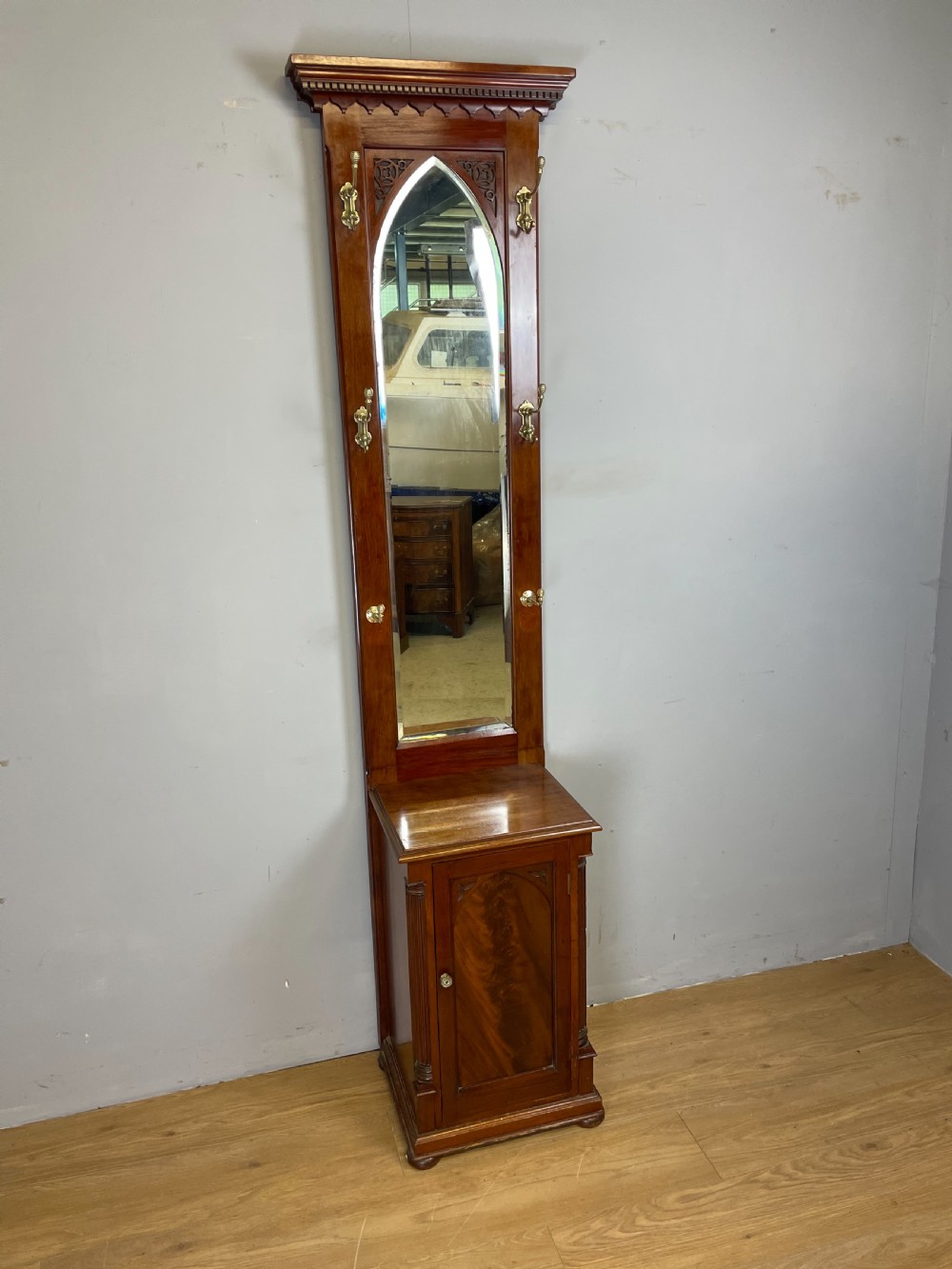 Flame mahogany nineteenth century  slim hall stand 