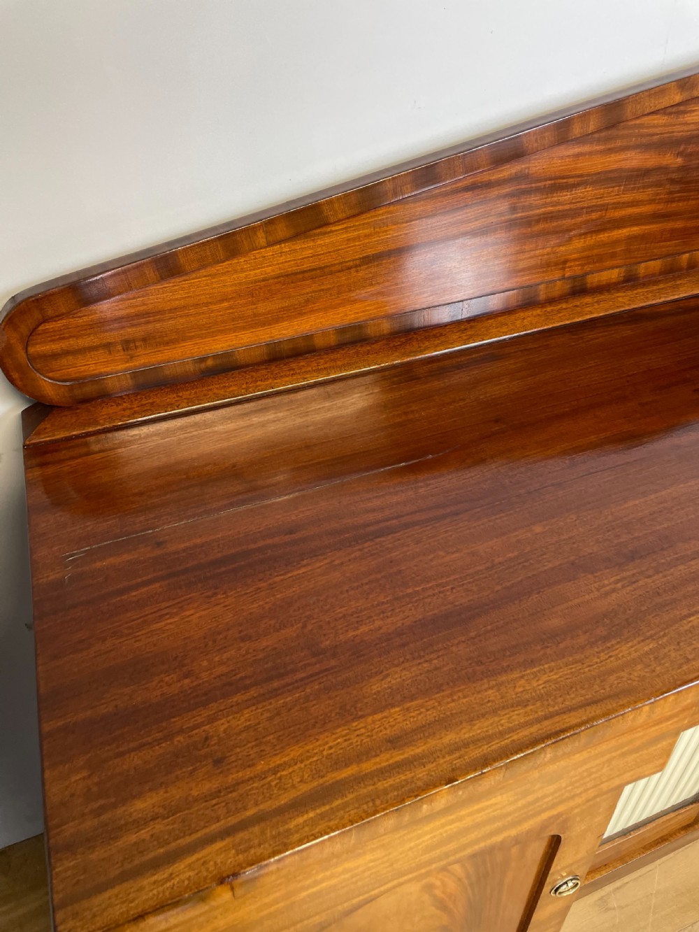 Late Georgian flame mahogany four door sideboard  View VI