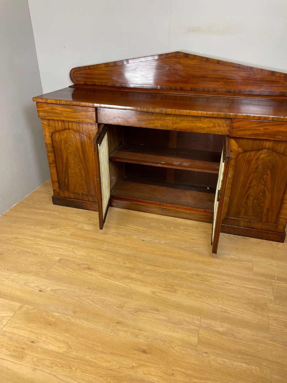Late Georgian flame mahogany four door sideboard  View X