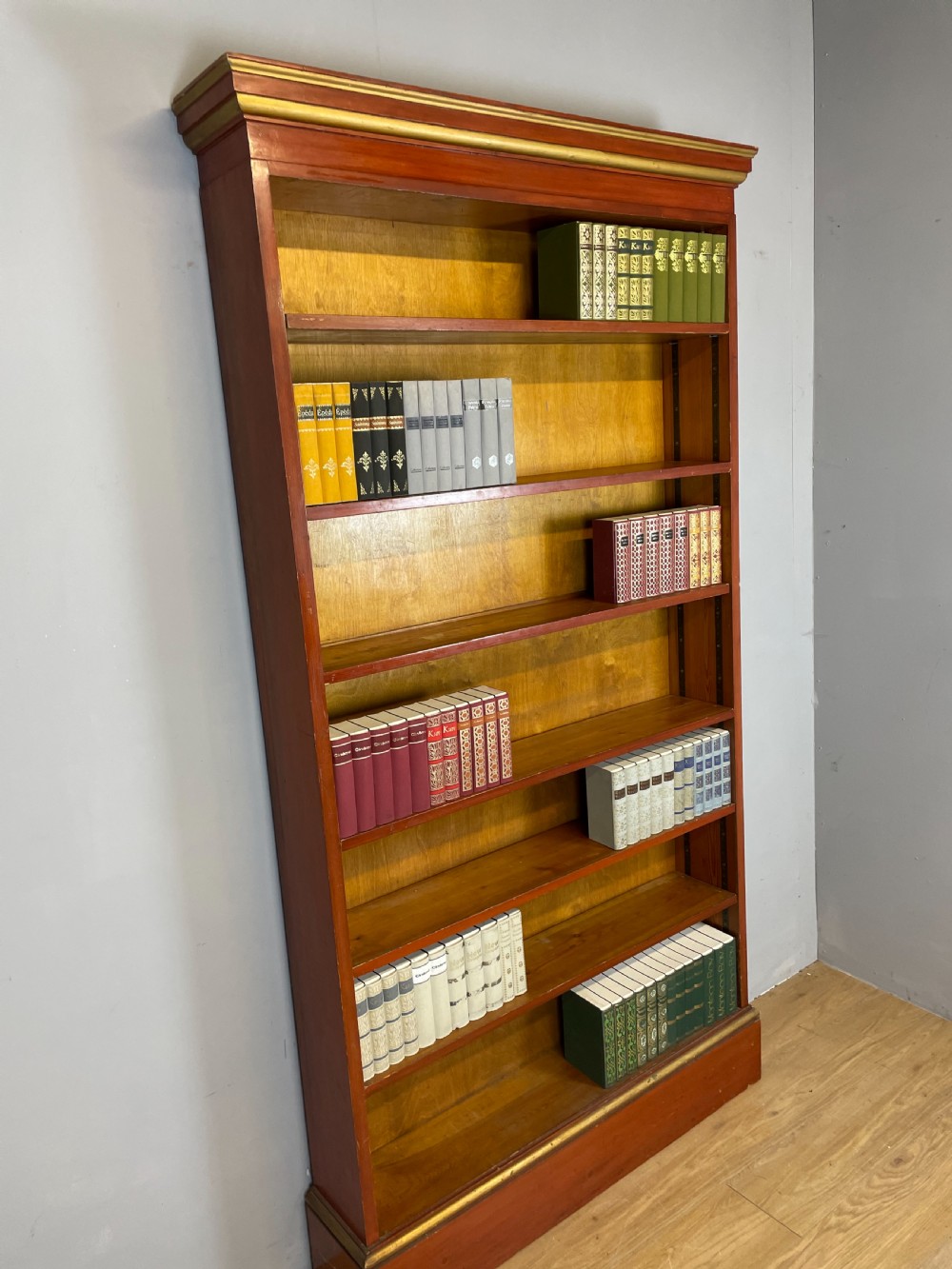 Large freestanding pine and gilt adjustable bookcase View II