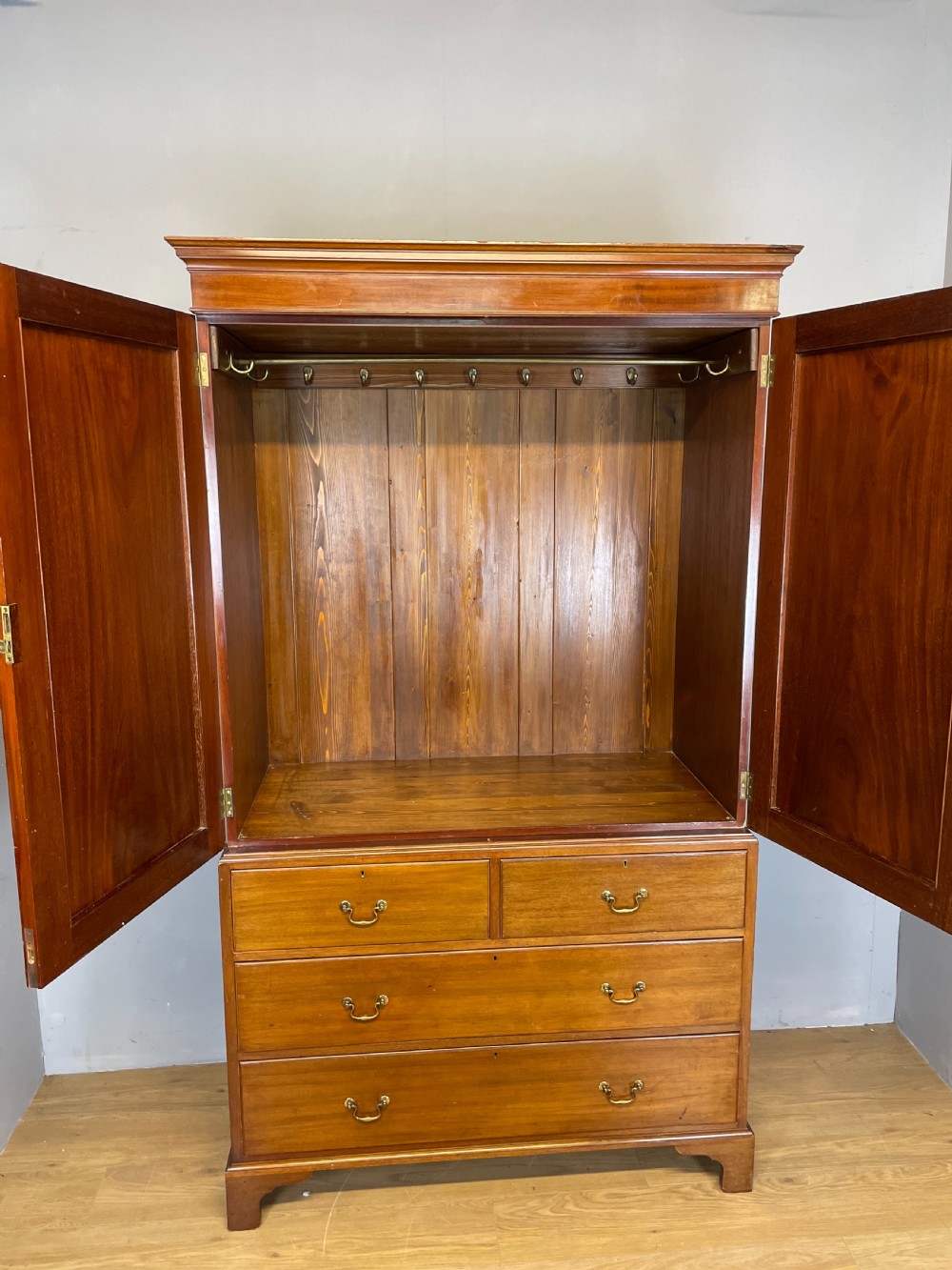 Nineteenth century mahogany clothes press View X