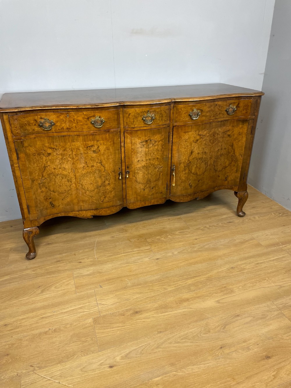 Serpentine fronted burr walnut sideboard by Maple and Co  View II