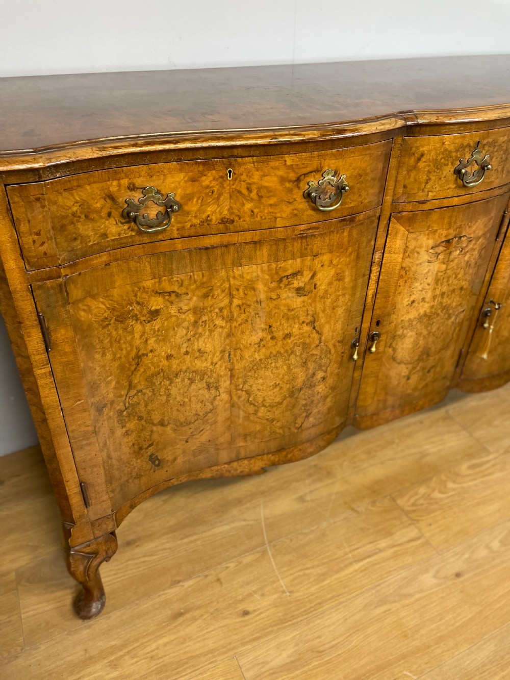 Serpentine fronted burr walnut sideboard by Maple and Co  View III