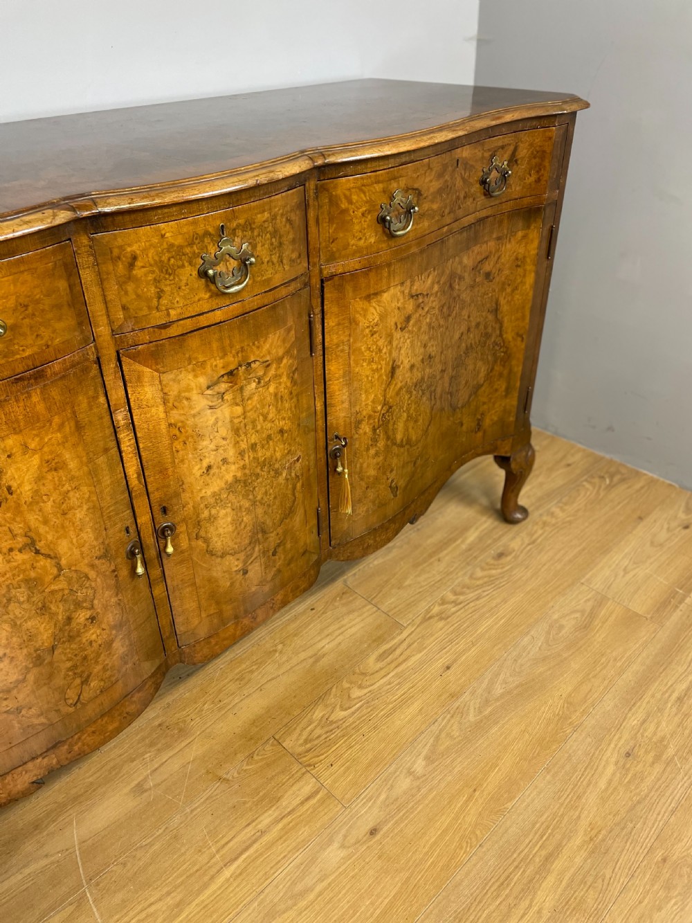 Serpentine fronted burr walnut sideboard by Maple and Co  View IV