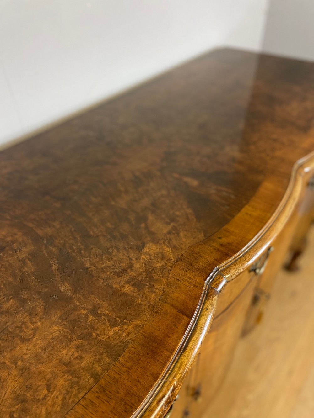 Serpentine fronted burr walnut sideboard by Maple and Co  View VI