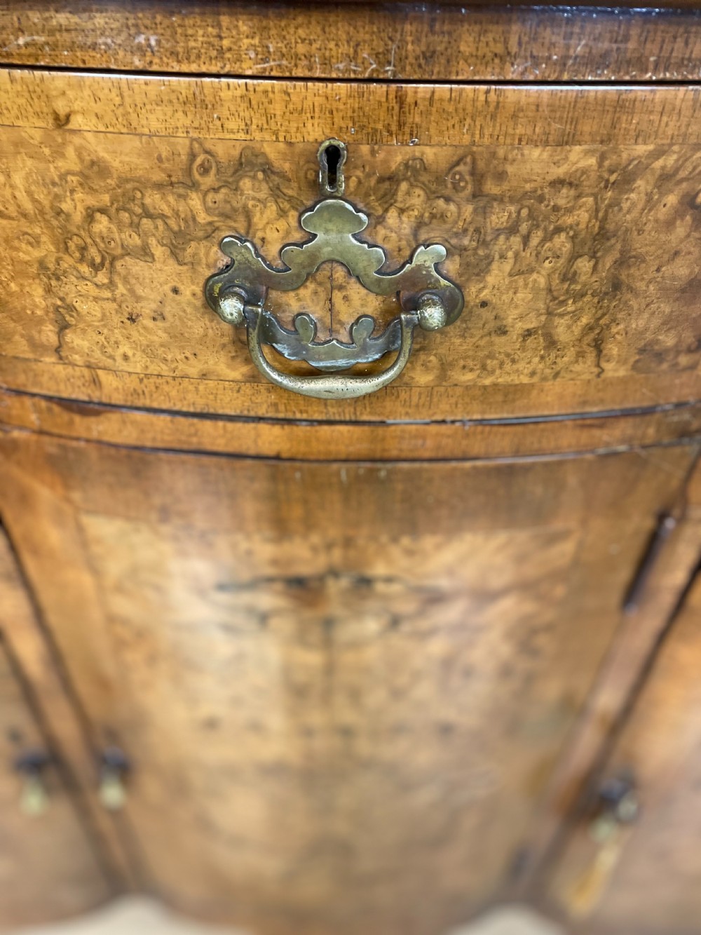 Serpentine fronted burr walnut sideboard by Maple and Co  View IX