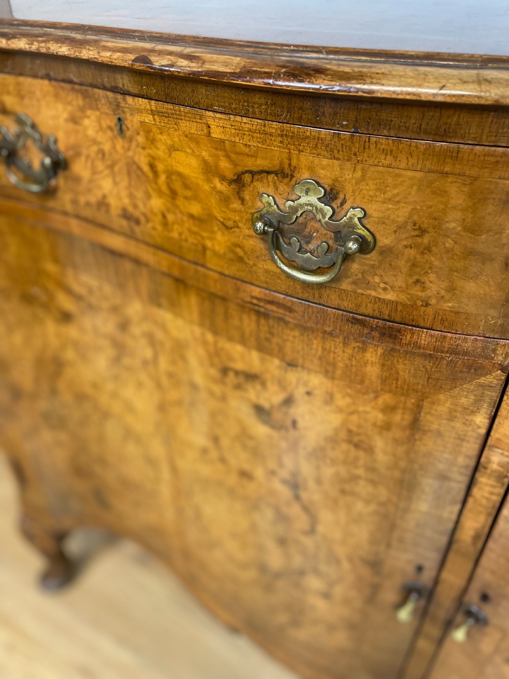 Serpentine fronted burr walnut sideboard by Maple and Co  View X