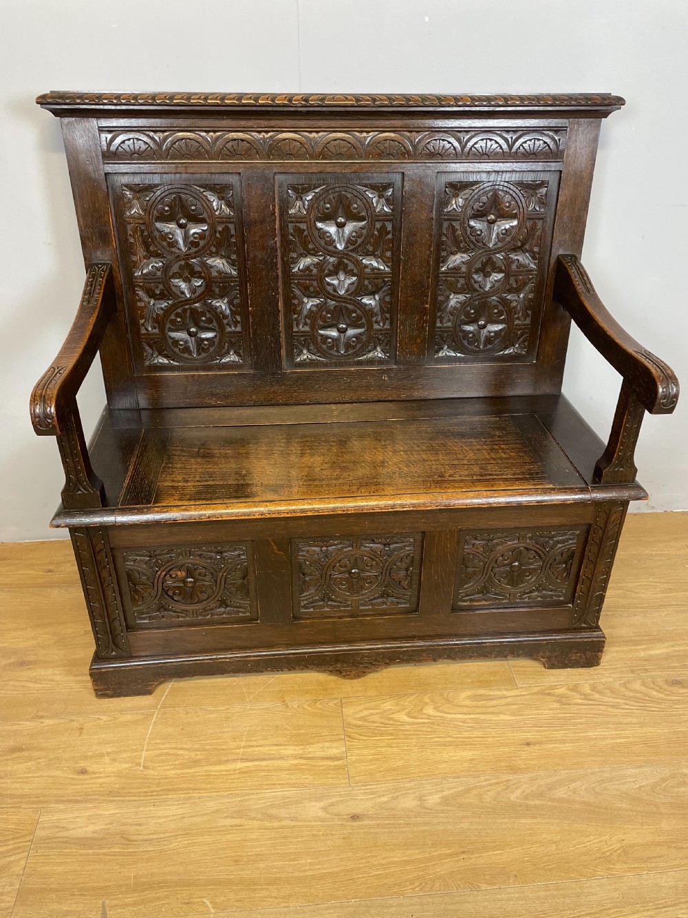 Nineteenth century carved oak settle View II