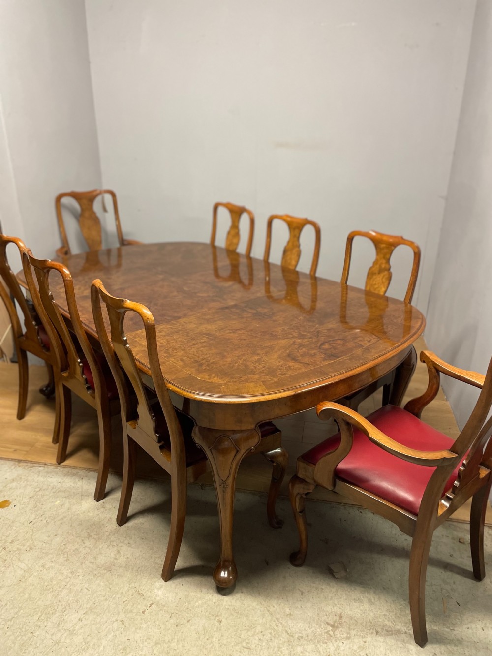Burr walnut extending dining table by Maple and Co  View XVII