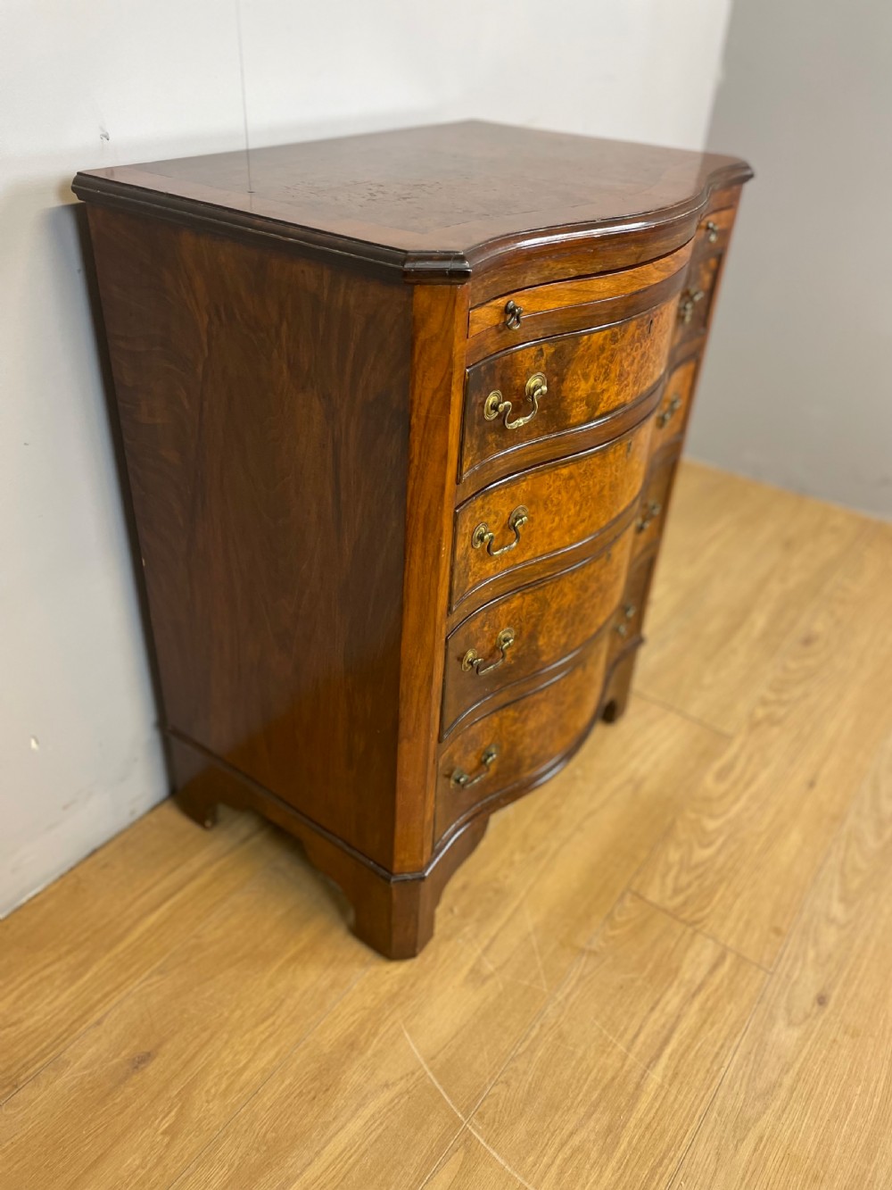 Small serpentine fronted burr walnut chest of drawers  View III