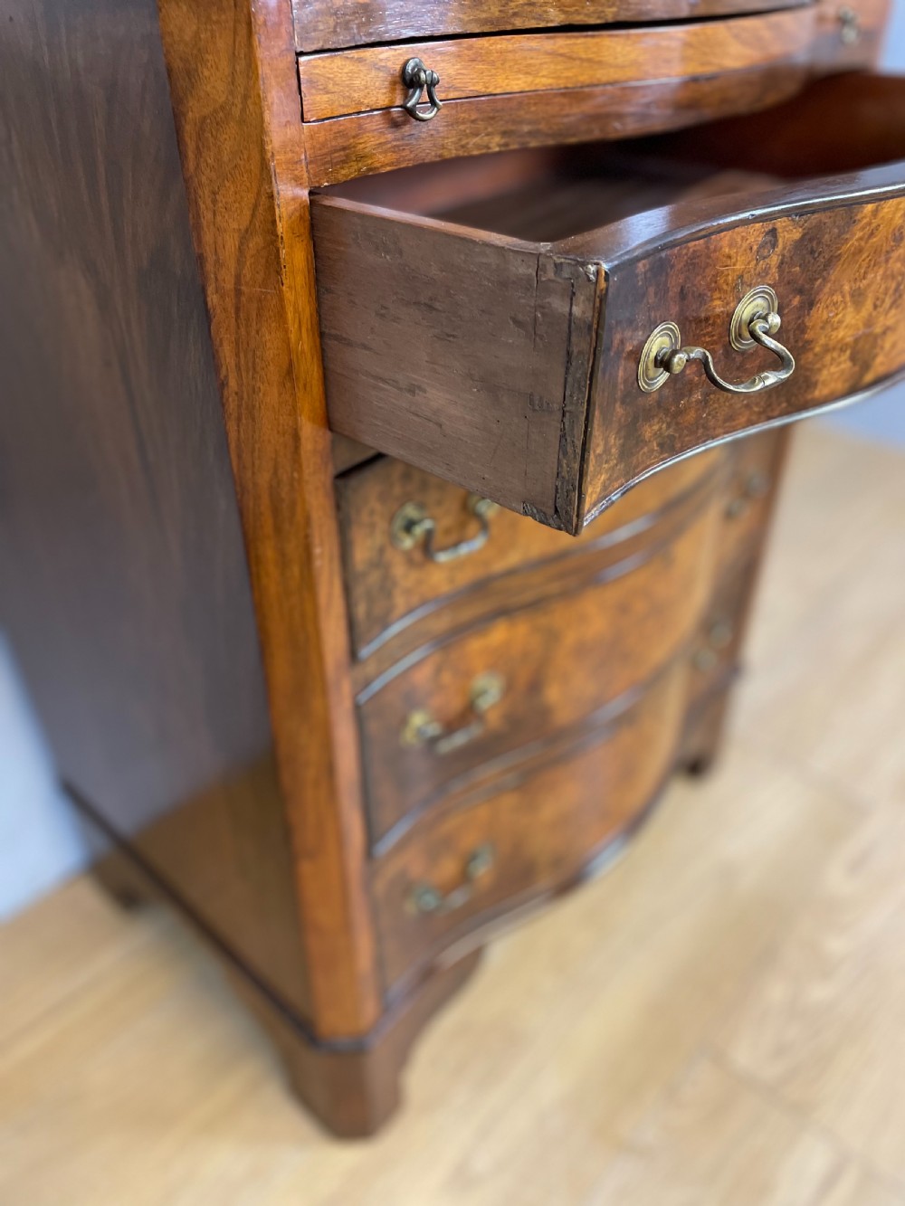 Small serpentine fronted burr walnut chest of drawers  View VI