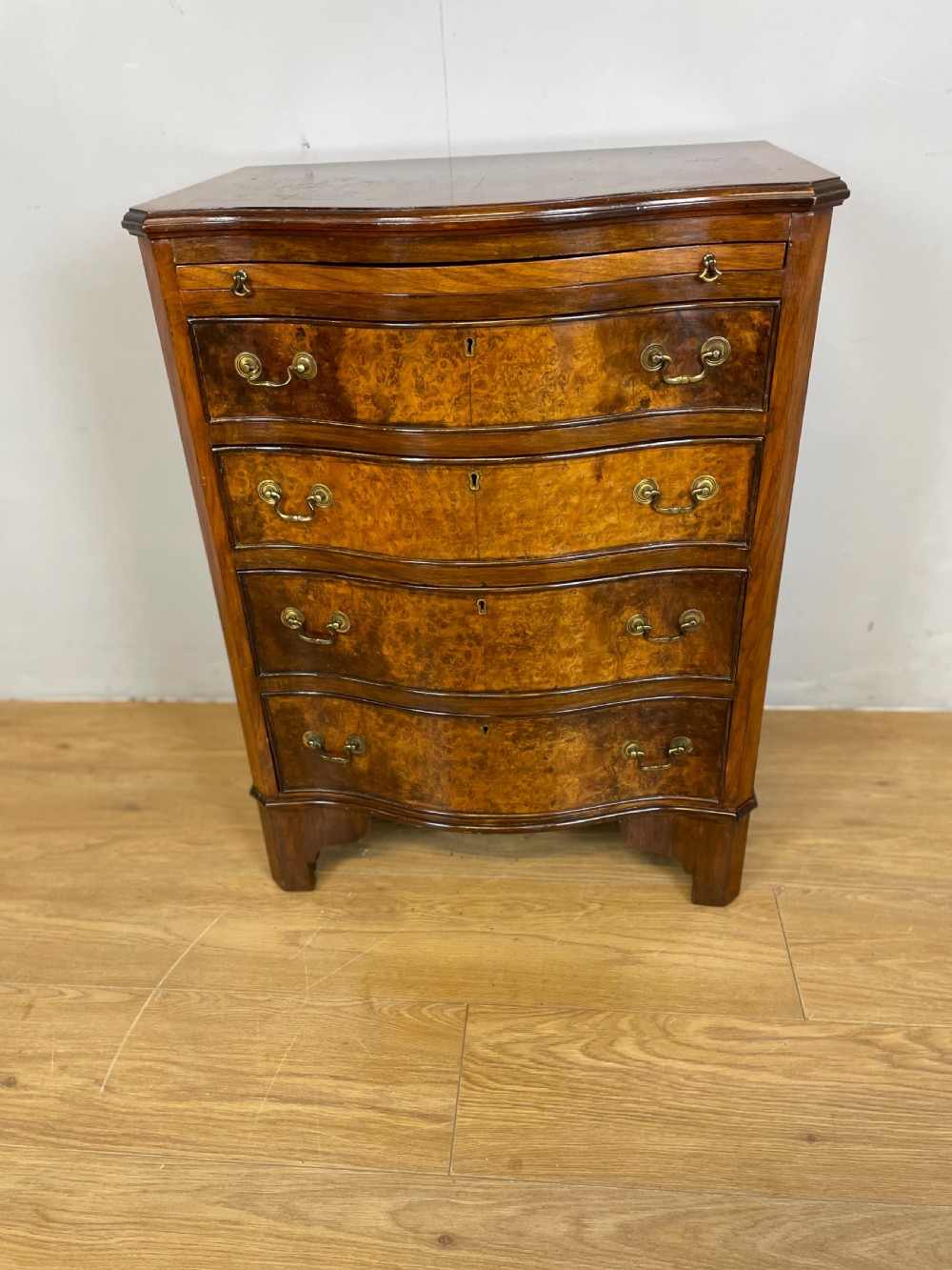 Small serpentine fronted burr walnut chest of drawers  View VIII