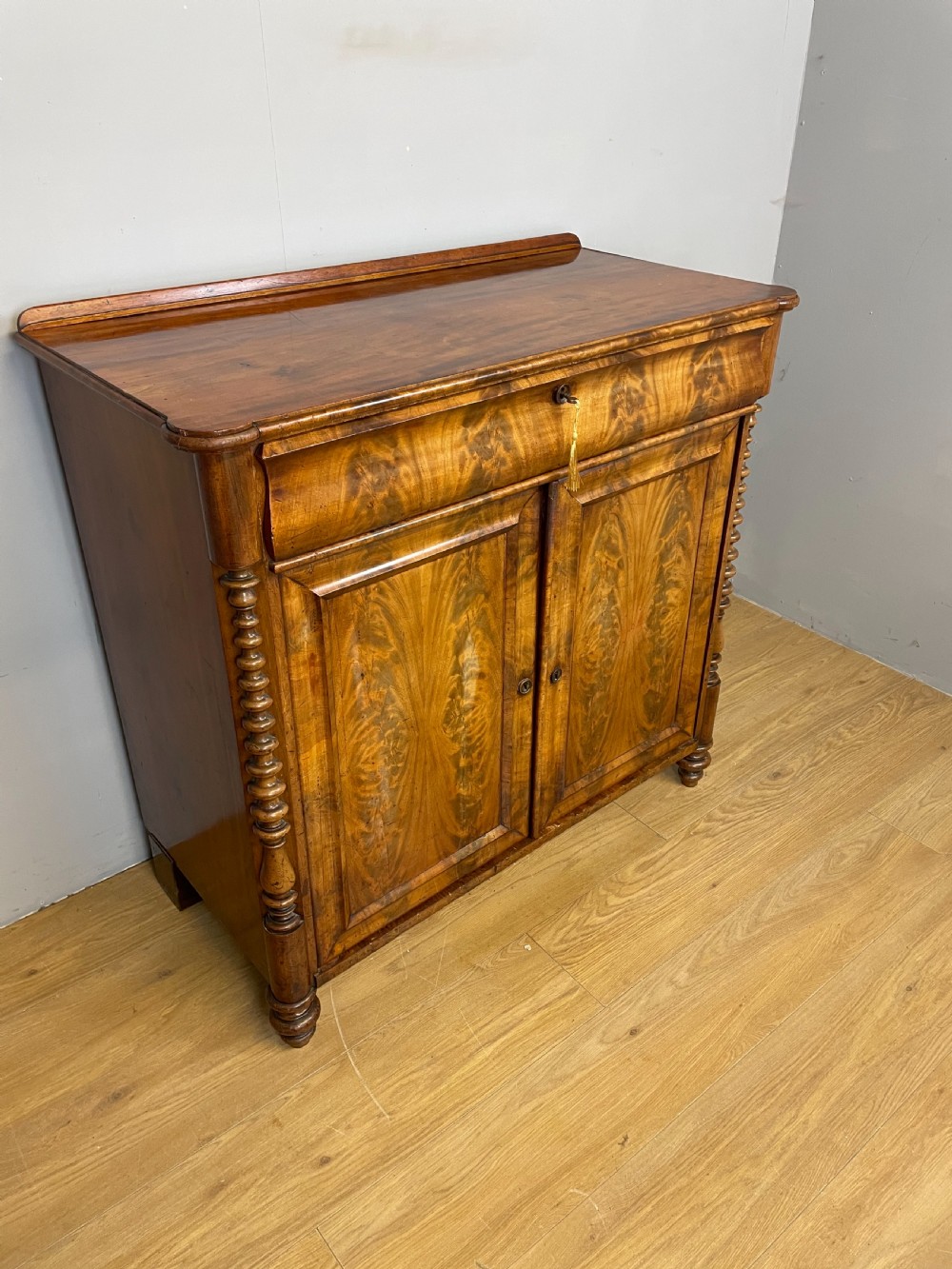 Nineteenth century Biedermeier flame mahogany side cabinet  View II