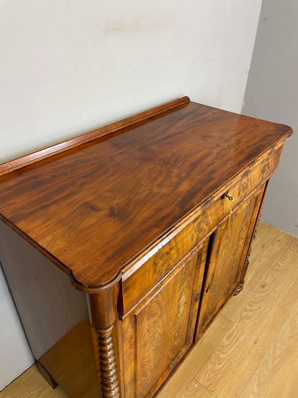 Nineteenth century Biedermeier flame mahogany side cabinet  View III