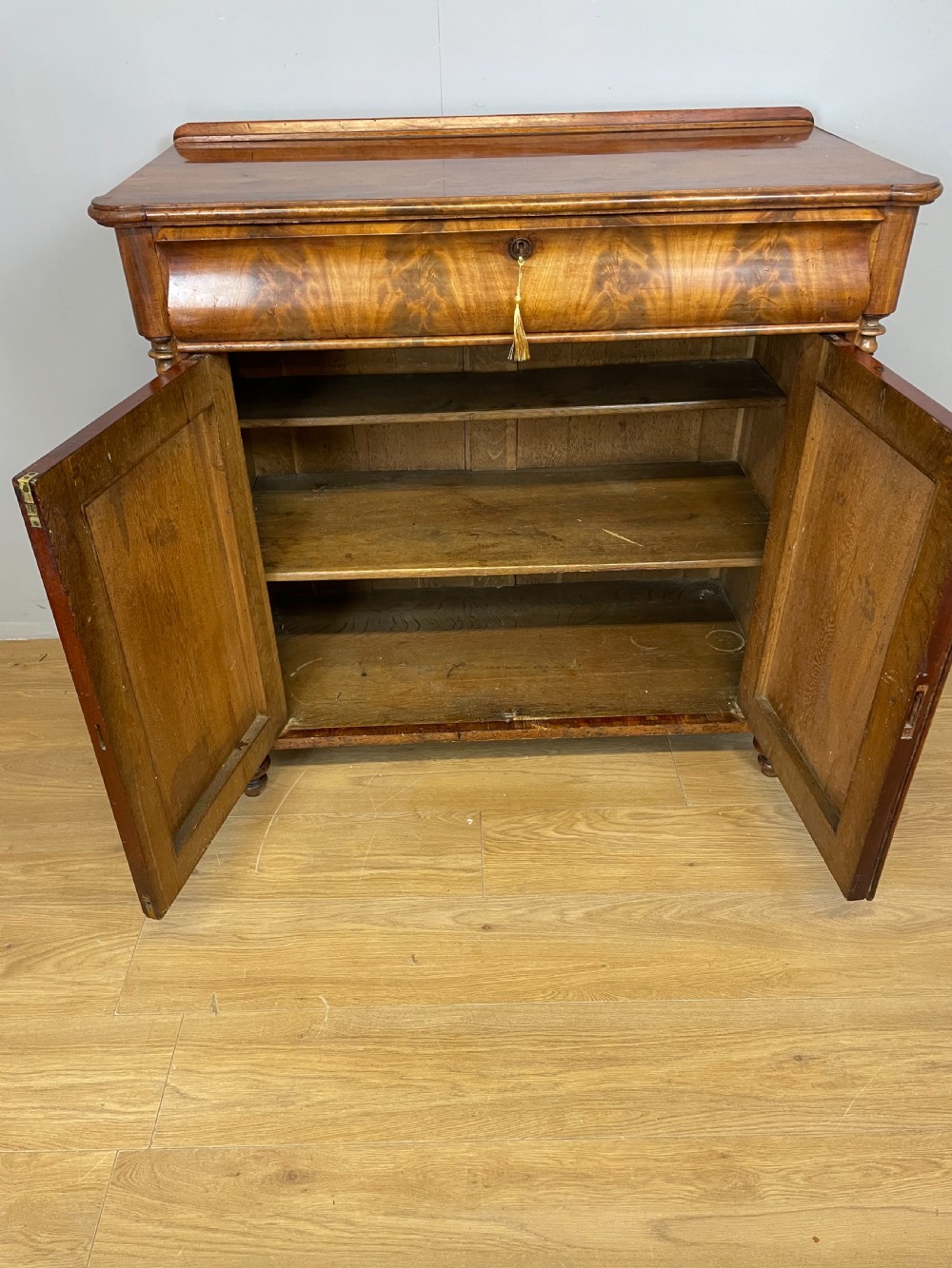 Nineteenth century Biedermeier flame mahogany side cabinet  View IX
