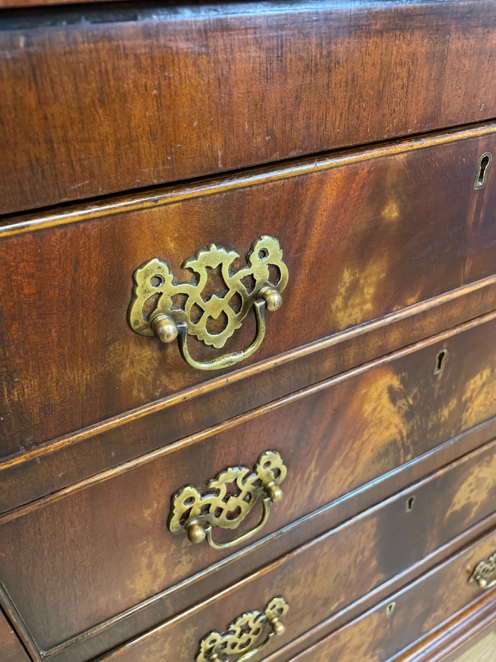 Small Flame mahogany bachelor chest of drawers circa 1920 View III