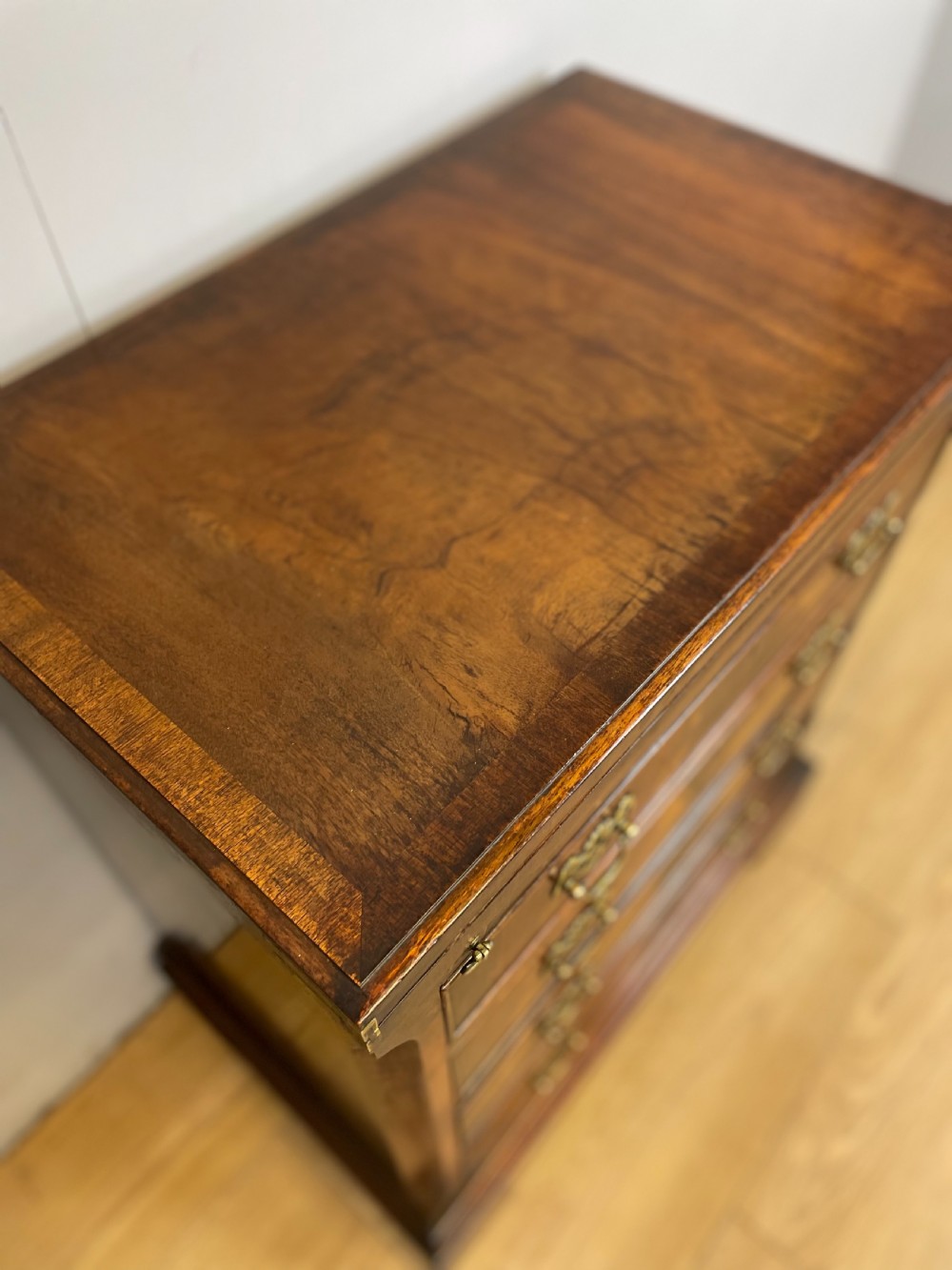 Small Flame mahogany bachelor chest of drawers circa 1920 View IV