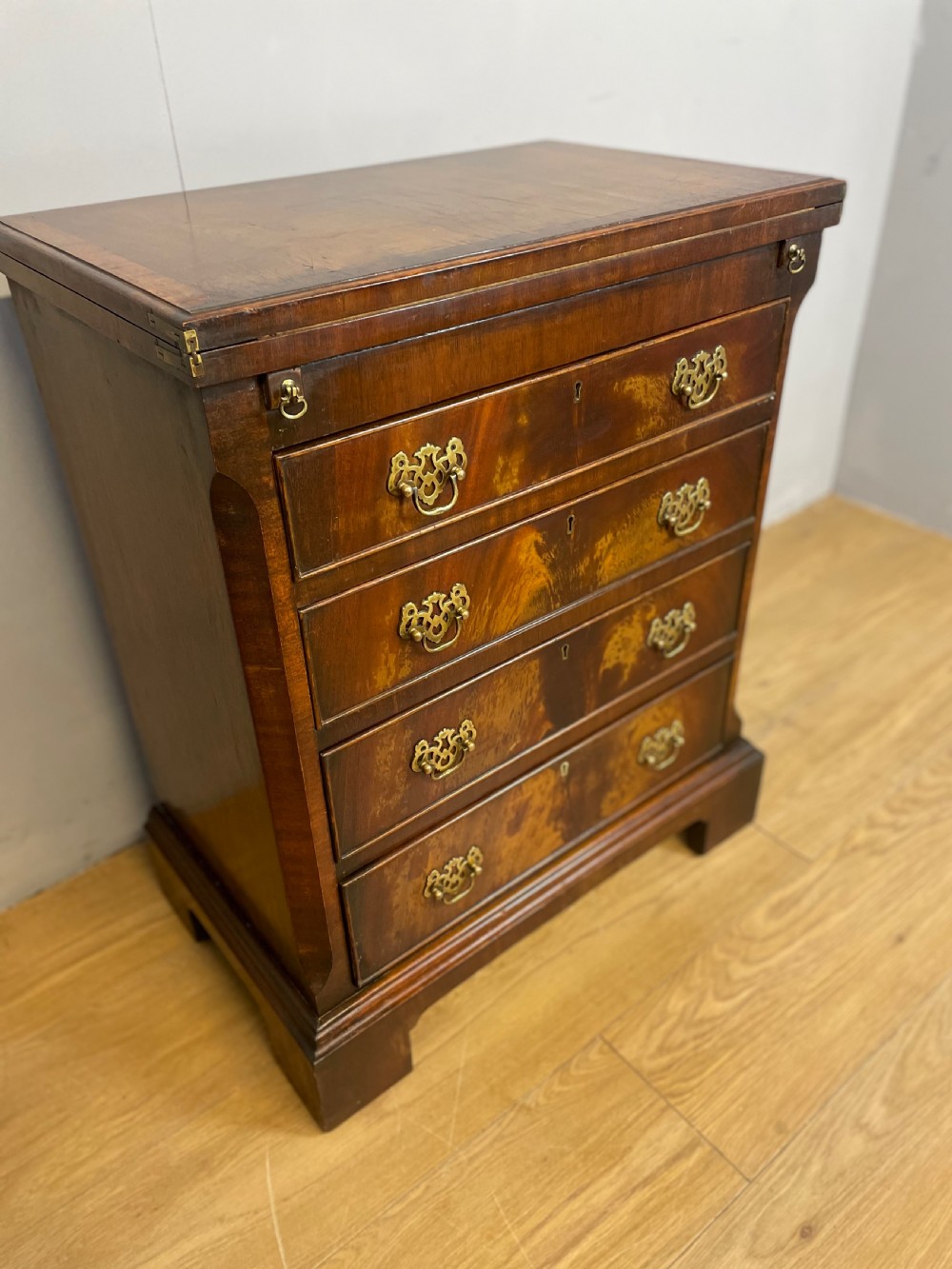 Small Flame mahogany bachelor chest of drawers circa 1920 View X