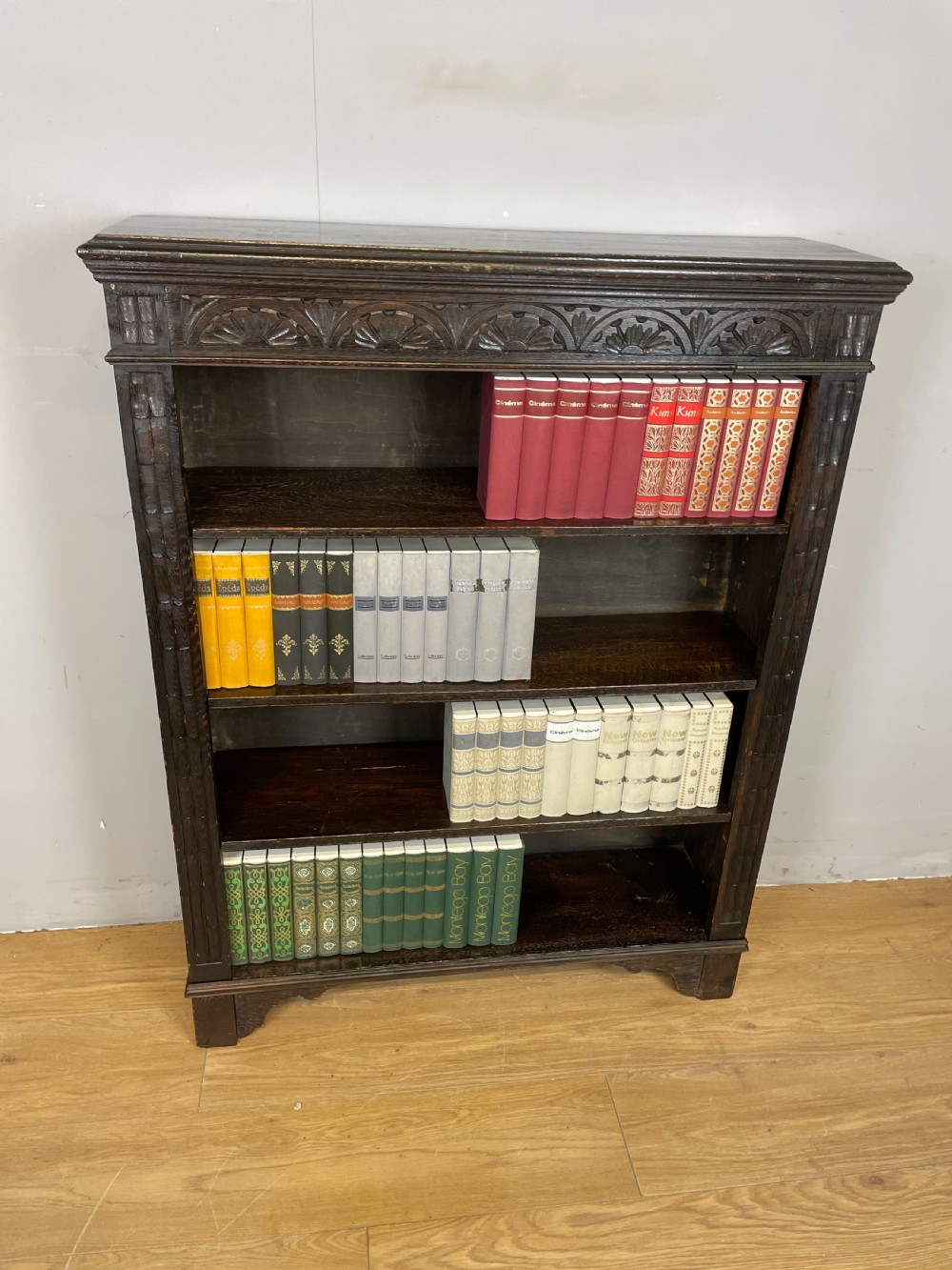 Edwardian carved oak open bookshelves 