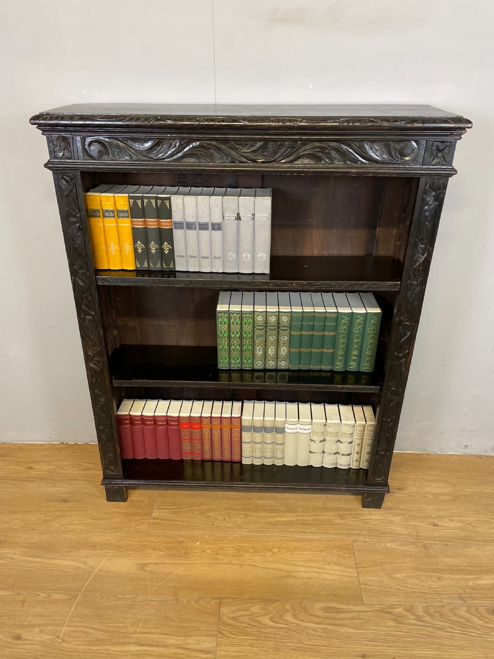 Freestanding late nineteenth century carved oak open bookcase  View III