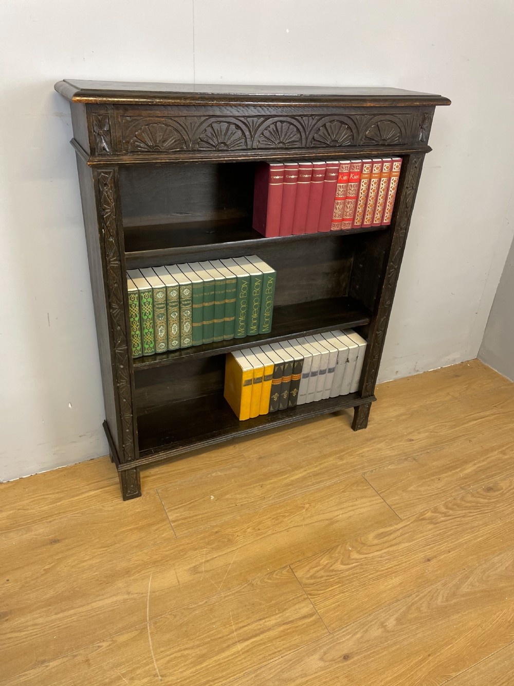 Edwardian carved oak open bookshelves 