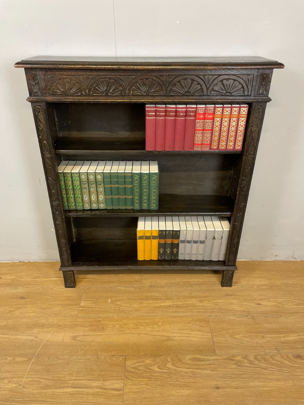 Edwardian carved oak open bookshelves  View II