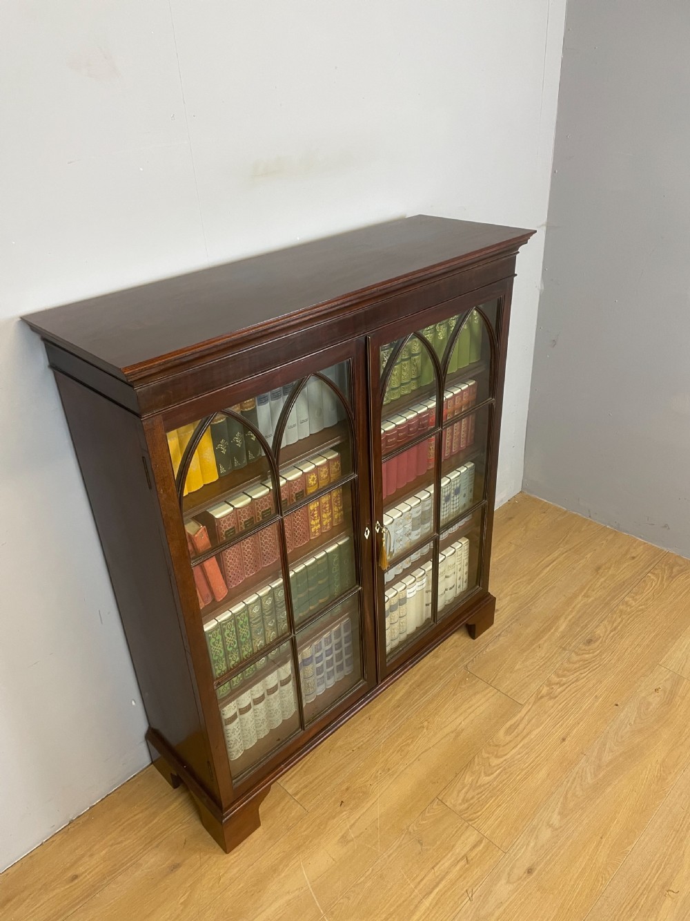 Georgian mahogany freestanding glazed bookcase View II