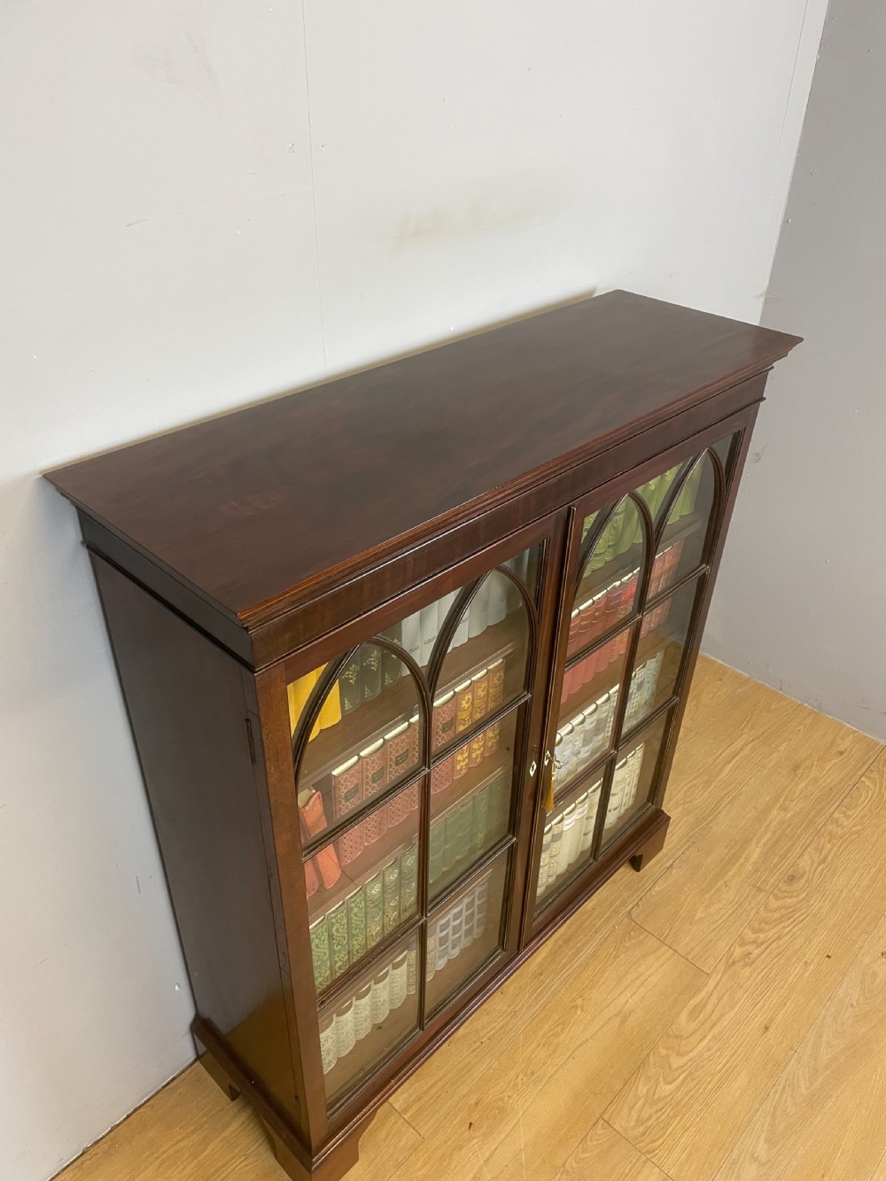 Georgian mahogany freestanding glazed bookcase View XI