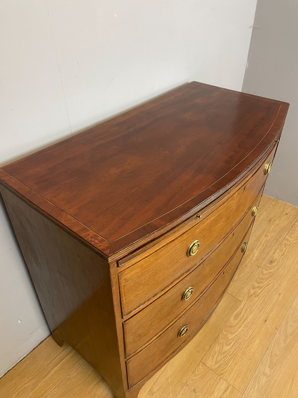 Georgian mahogany bow front chest of drawers  View II