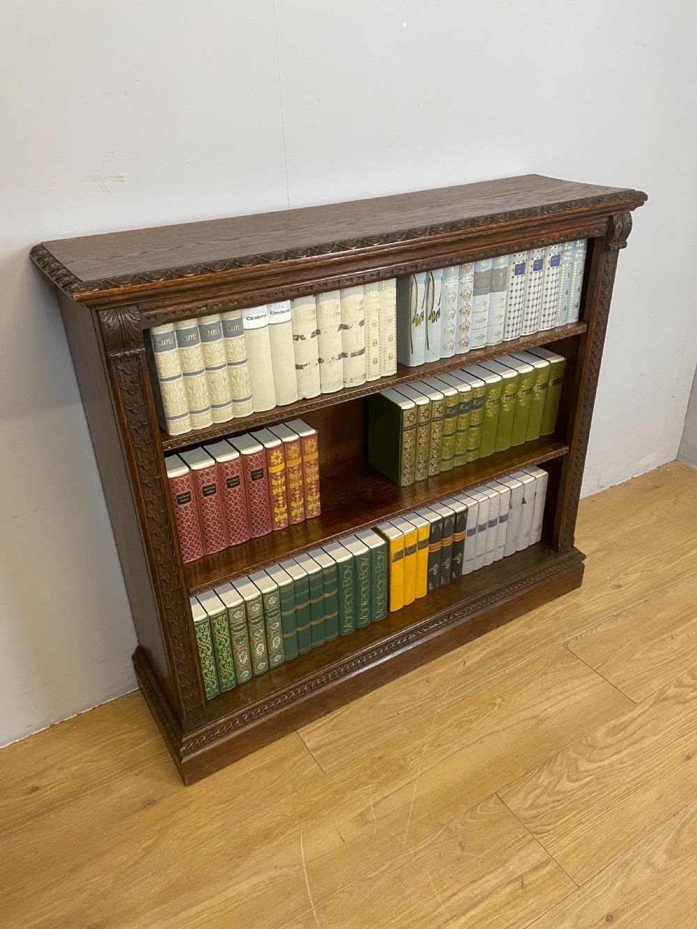 Late nineteenth century carved oak open bookcase 