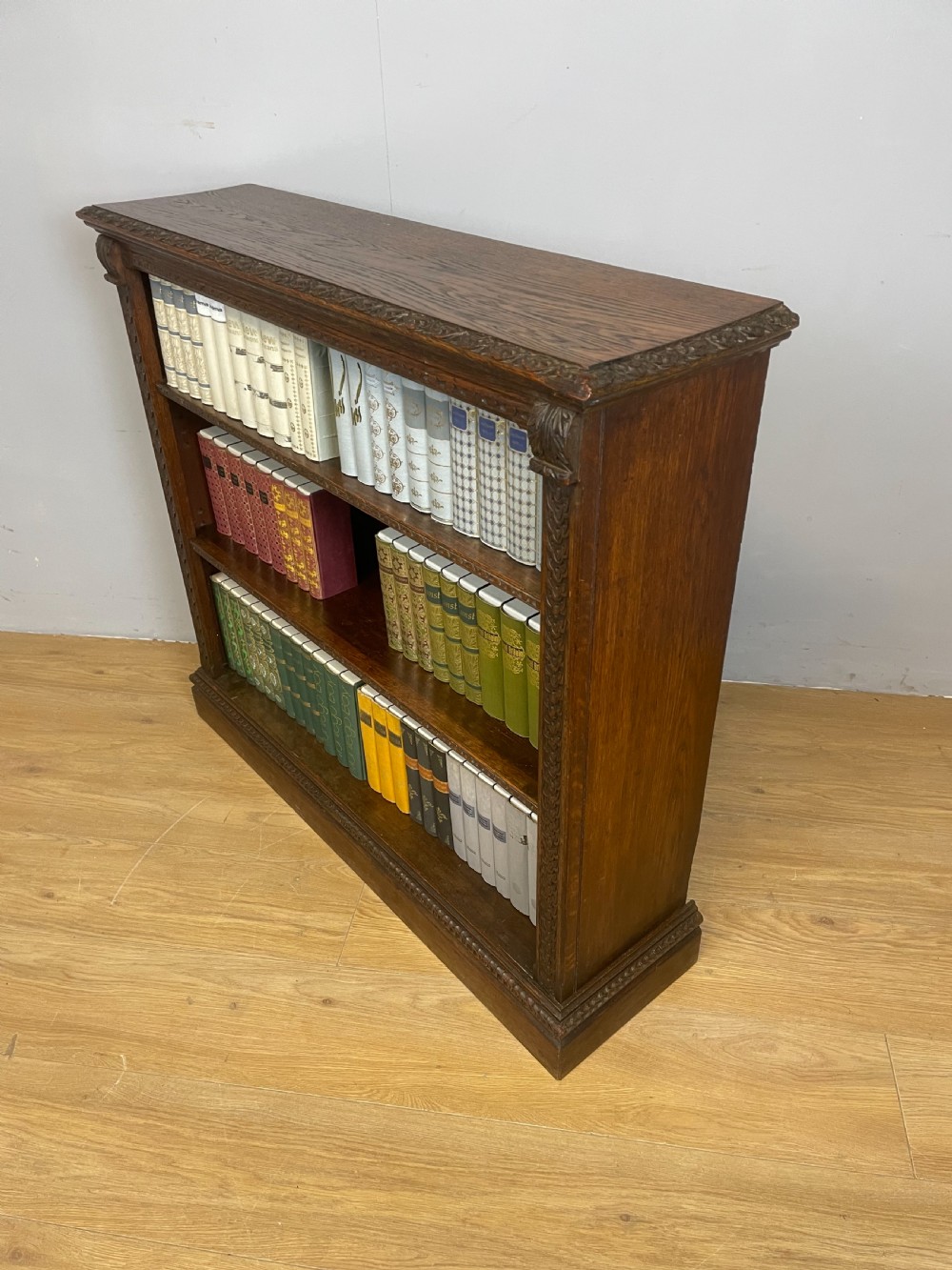 Late nineteenth century carved oak open bookcase  View XI