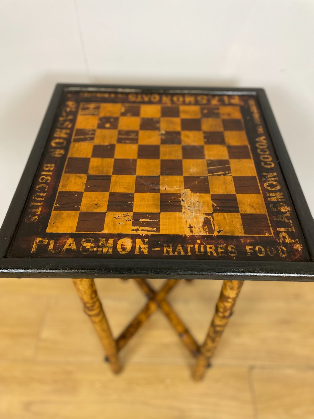 Bamboo chess table advertising Plasmon cocoa View II