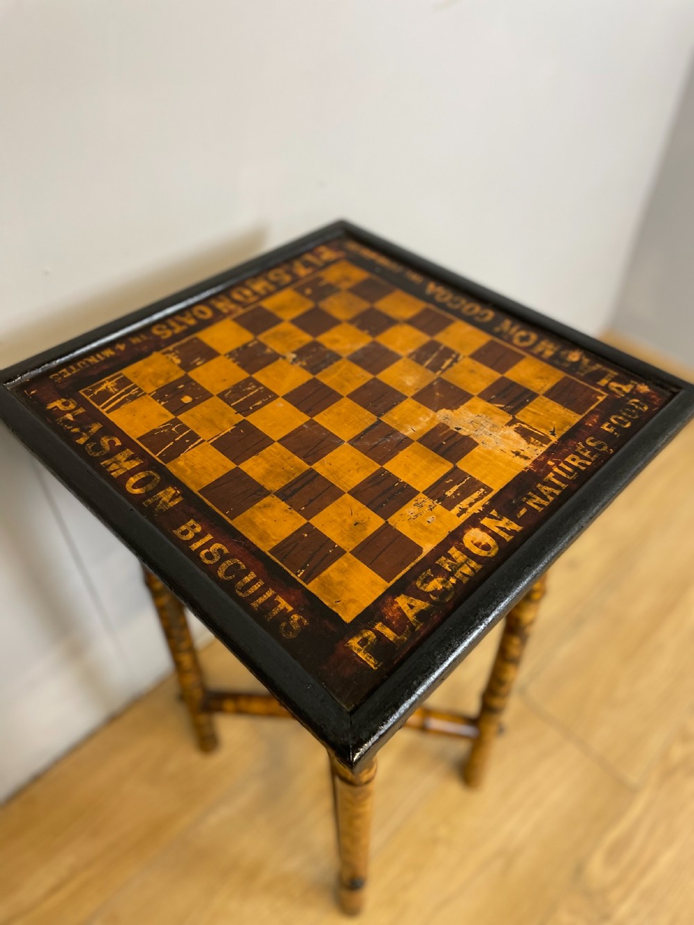 Bamboo chess table advertising Plasmon cocoa View V
