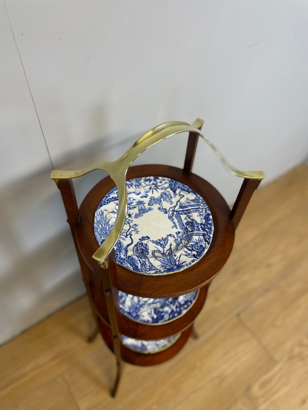 Nineteenth century brass and mahogany cake stand  View II