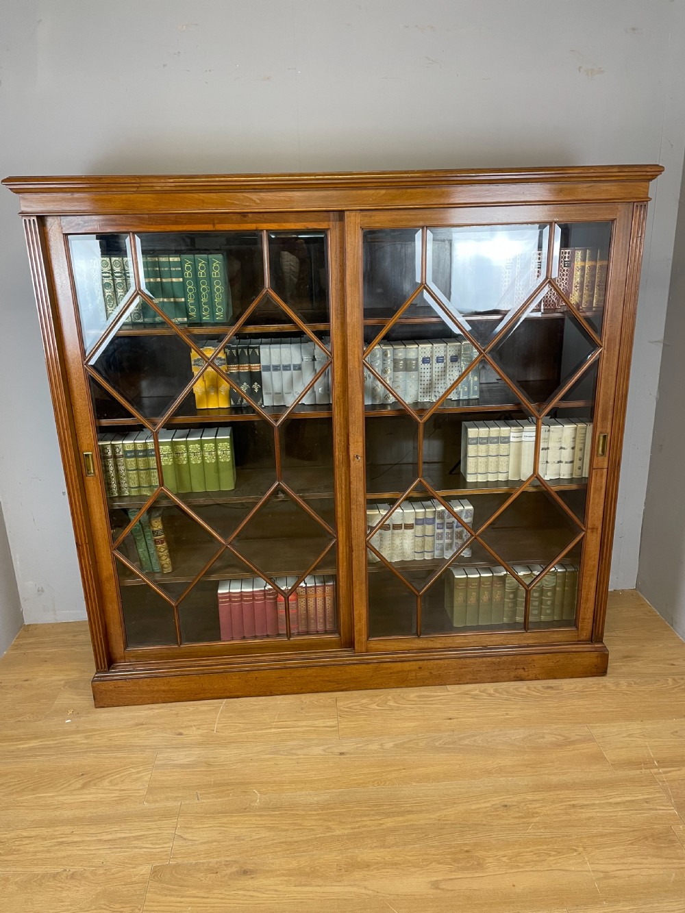 Nineteenth century large walnut astragal glazed bookcase  View II