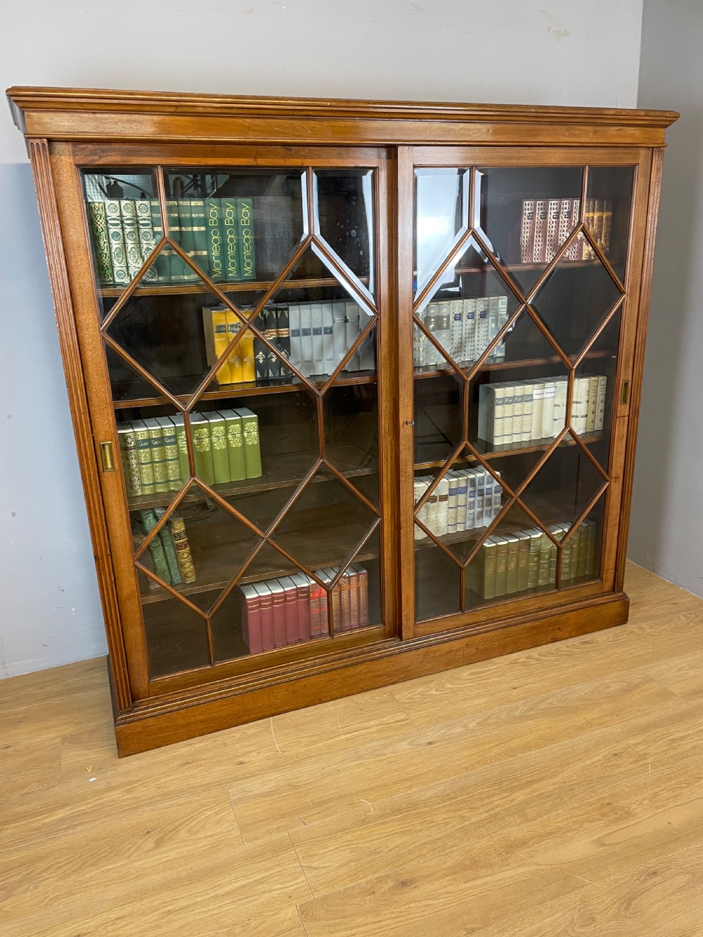 Nineteenth century large walnut astragal glazed bookcase  View XI