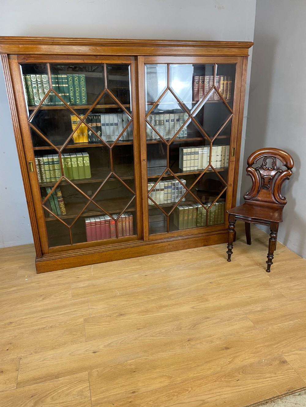 Nineteenth century large walnut astragal glazed bookcase  View XII