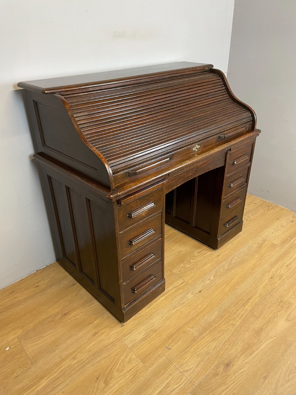Oak twin pedestal roll top desk in original condition 