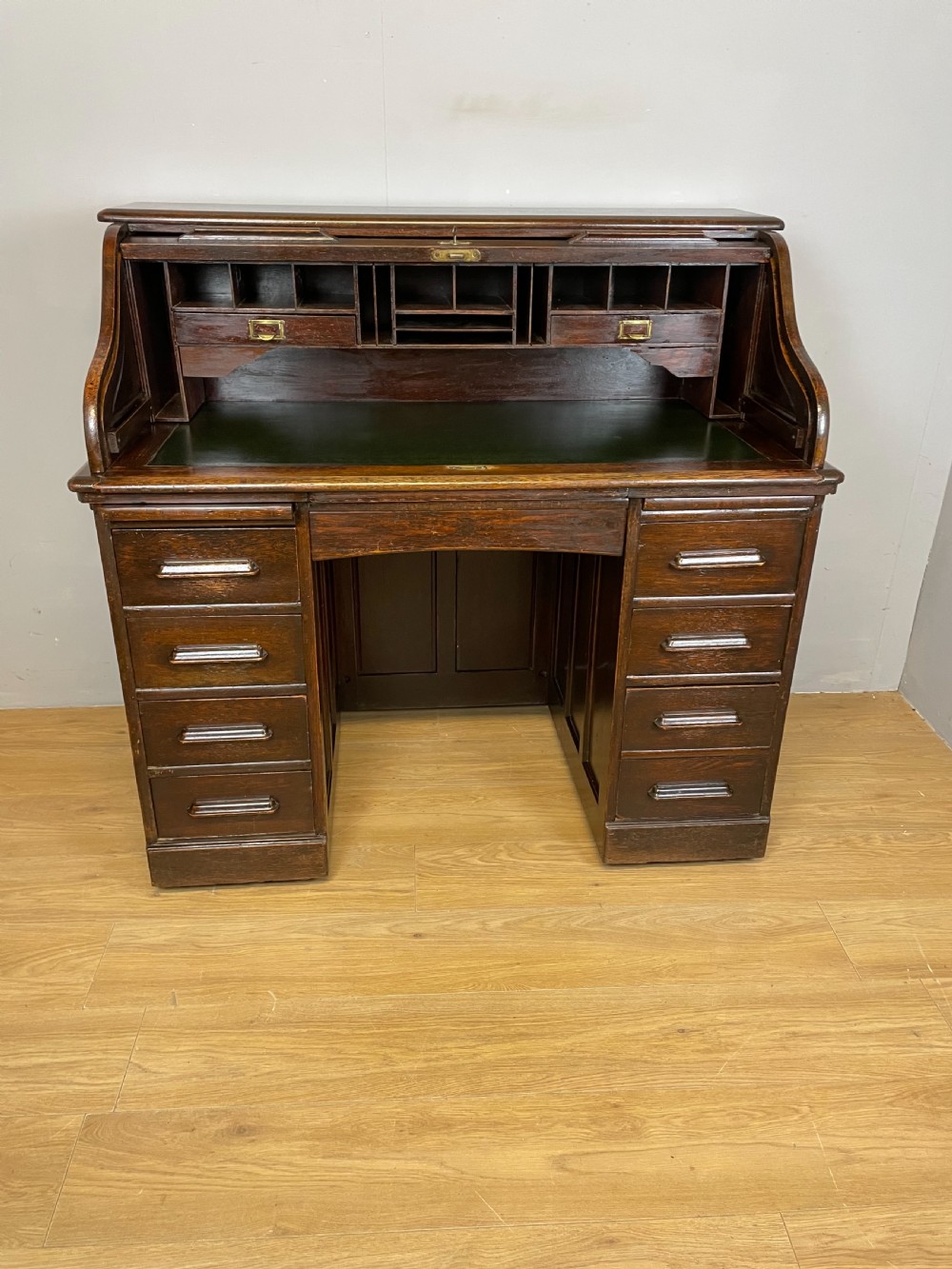 Oak twin pedestal roll top desk in original condition  View II