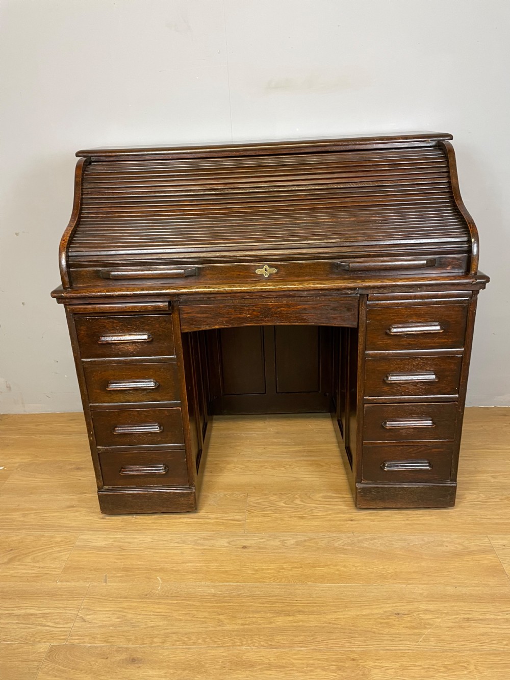 Oak twin pedestal roll top desk in original condition  View III