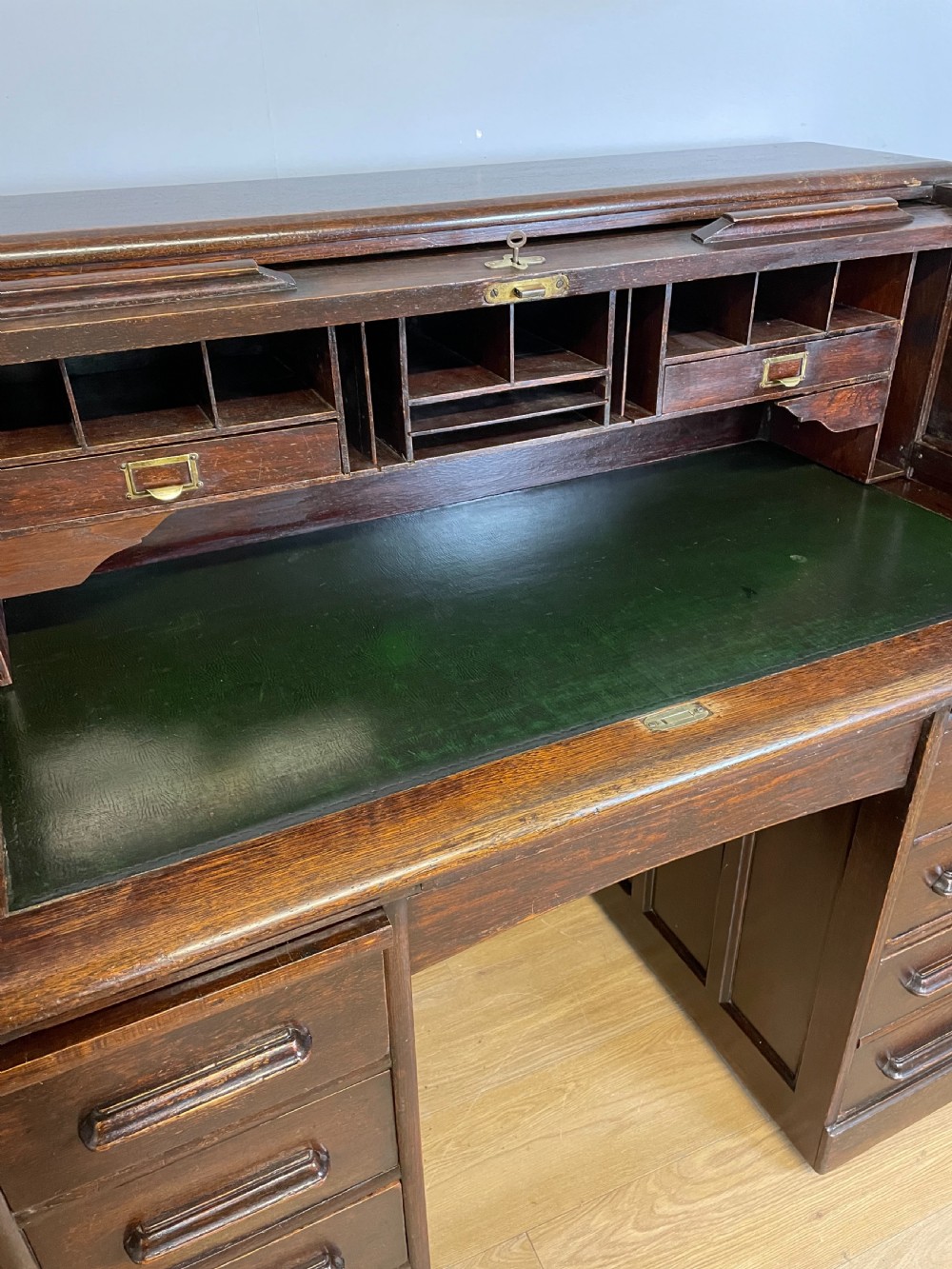 Oak twin pedestal roll top desk in original condition  View VI