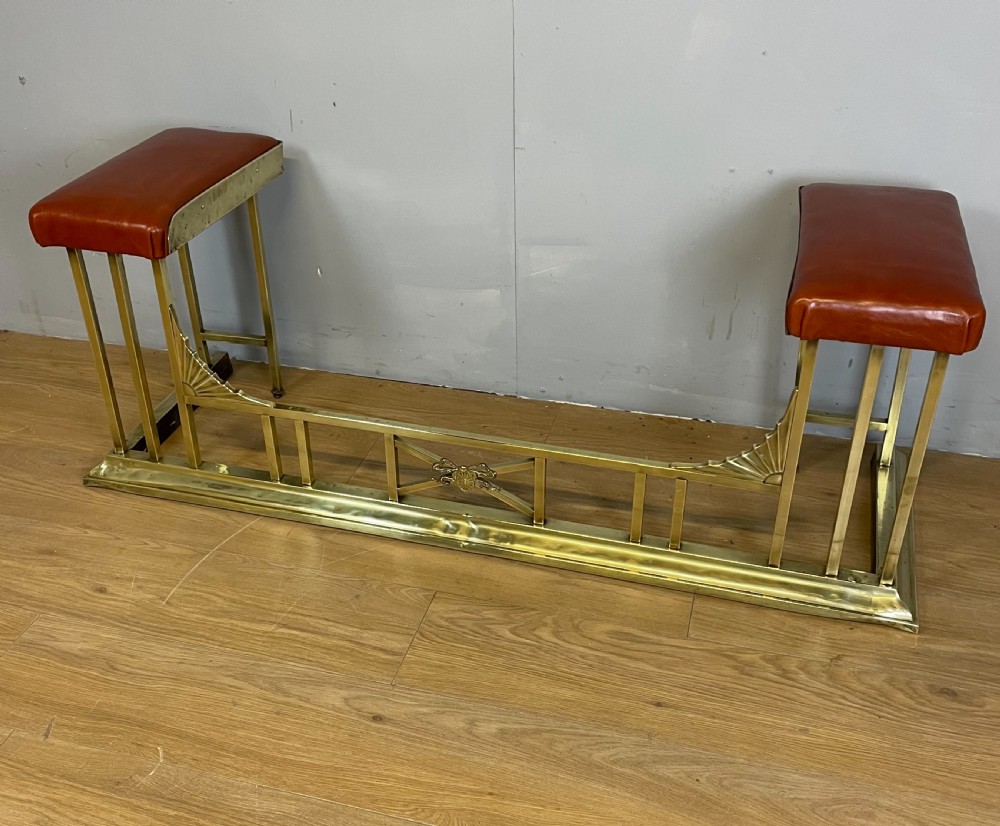 Edwardian brass and leather club fender View II