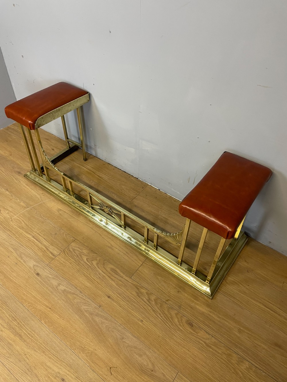 Edwardian brass and leather club fender View X