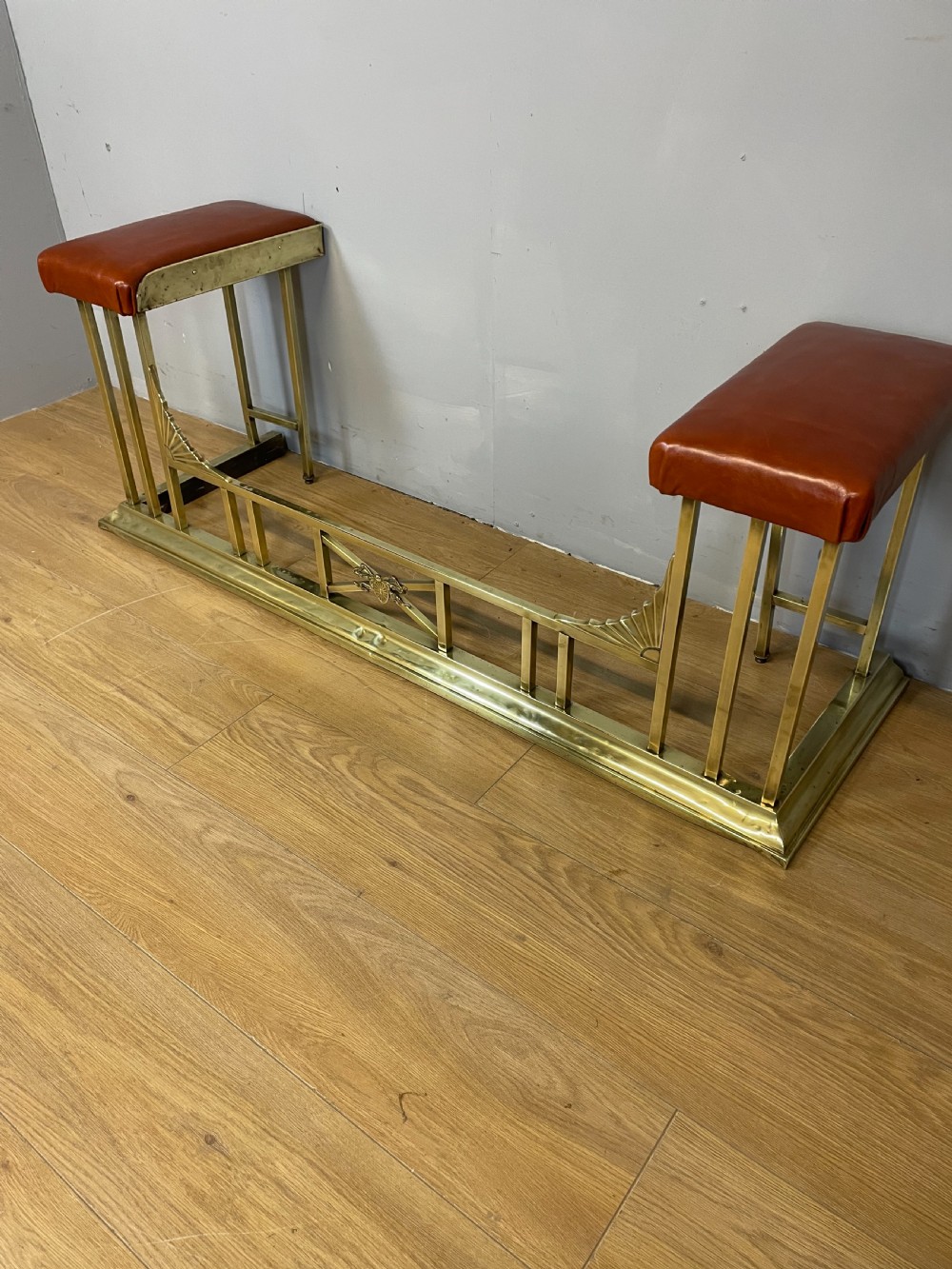 Edwardian brass and leather club fender View XI